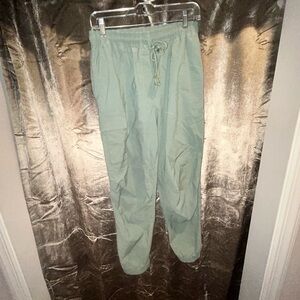 Sweaty Betty brand green cargo pants from Evereve